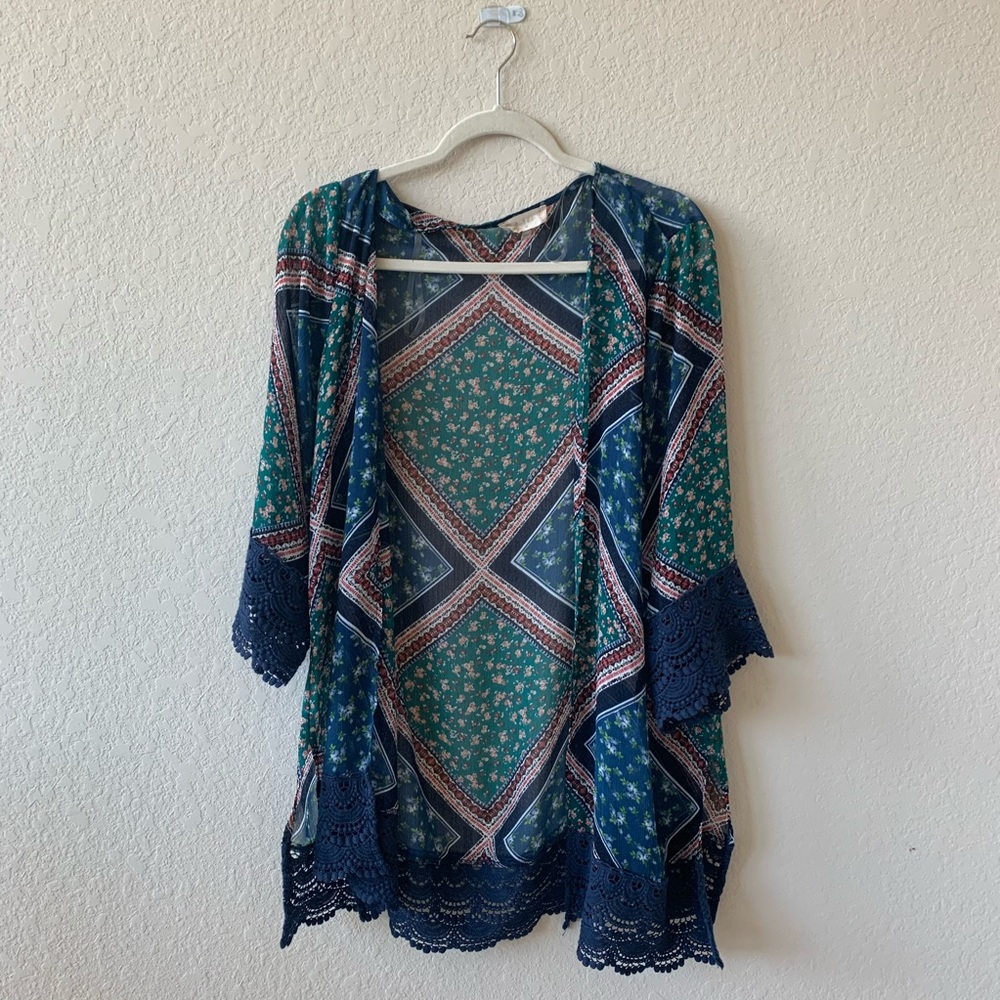 blue and green altar’d state cover up